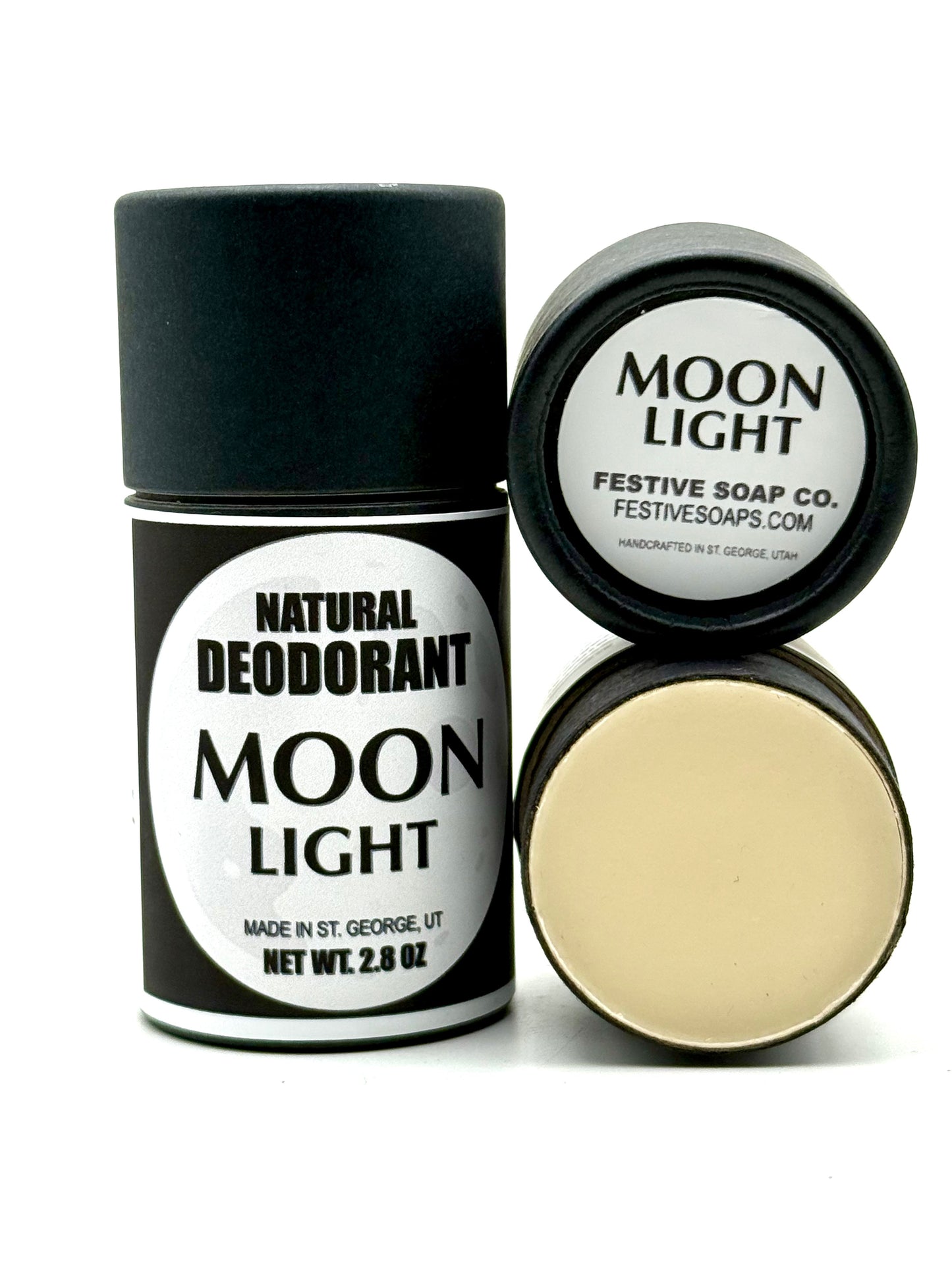 Two Moonlight tubes of deodorant, one with the cap off.