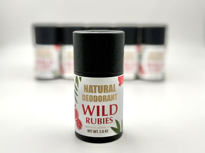 Deodorant stick labeled 'Wild Rubies' with a black cap on a white background