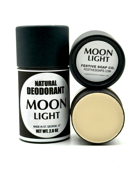 Two Moonlight tubes of deodorant, one with the cap off.