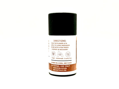 Tube of deodorant with a label on a white background. It has the direction for use, that it's vegan, homemade and cruelty free. 