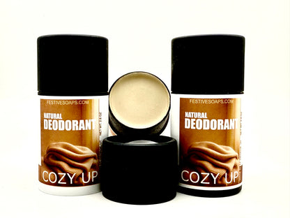 3 tubes of 'Cozy Up' natural deodorant from Festive Soaps on a white background