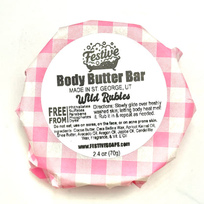 Body butter bar with pink and white checkered wrapper and label on a white background