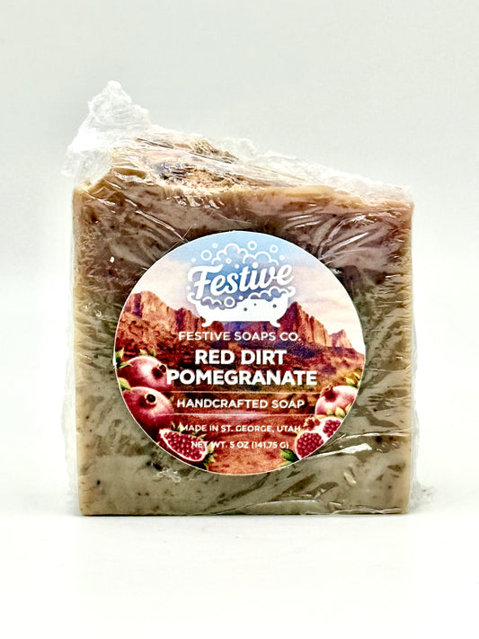 Handcrafted soap bar with a label on a white background