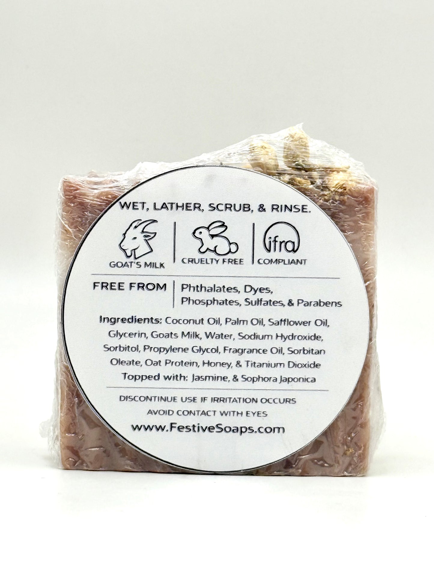 Bar of soap with a label on a white background