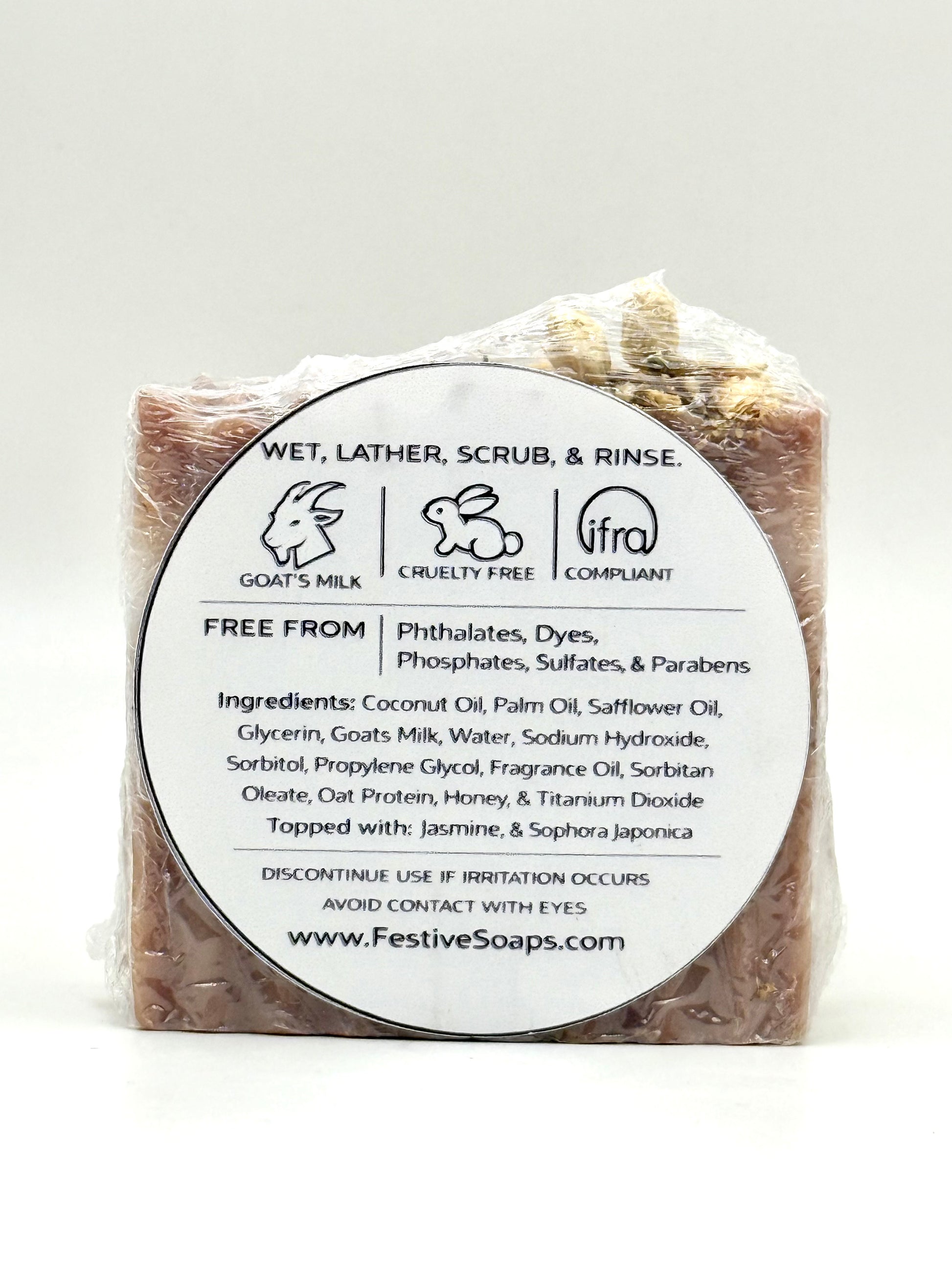 Bar of soap with a label on a white background
