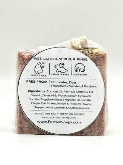 Bar of soap with a label on a white background