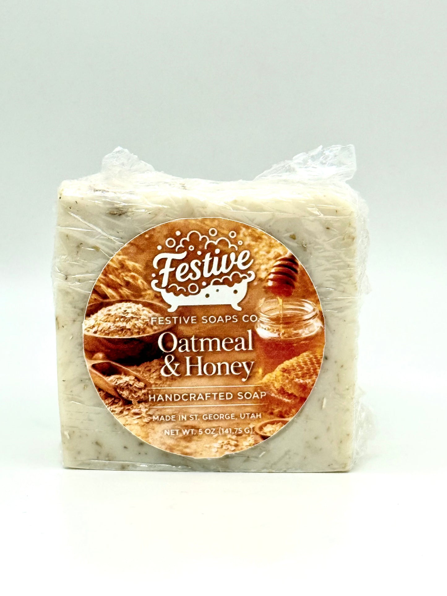Bar of soap with 'Festive Soaps Co' label on a white background