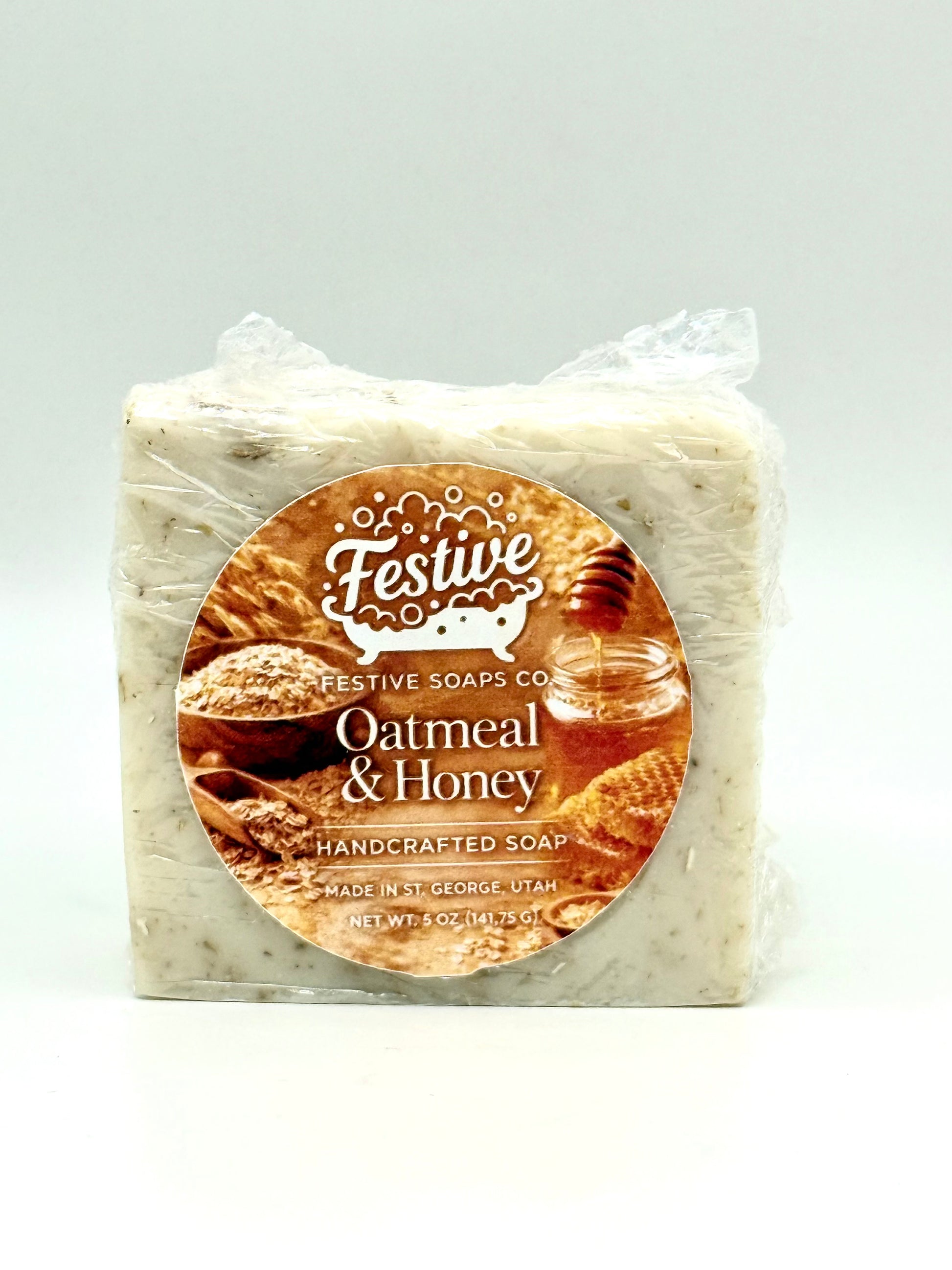Bar of soap with 'Festive Soaps Co' label on a white background