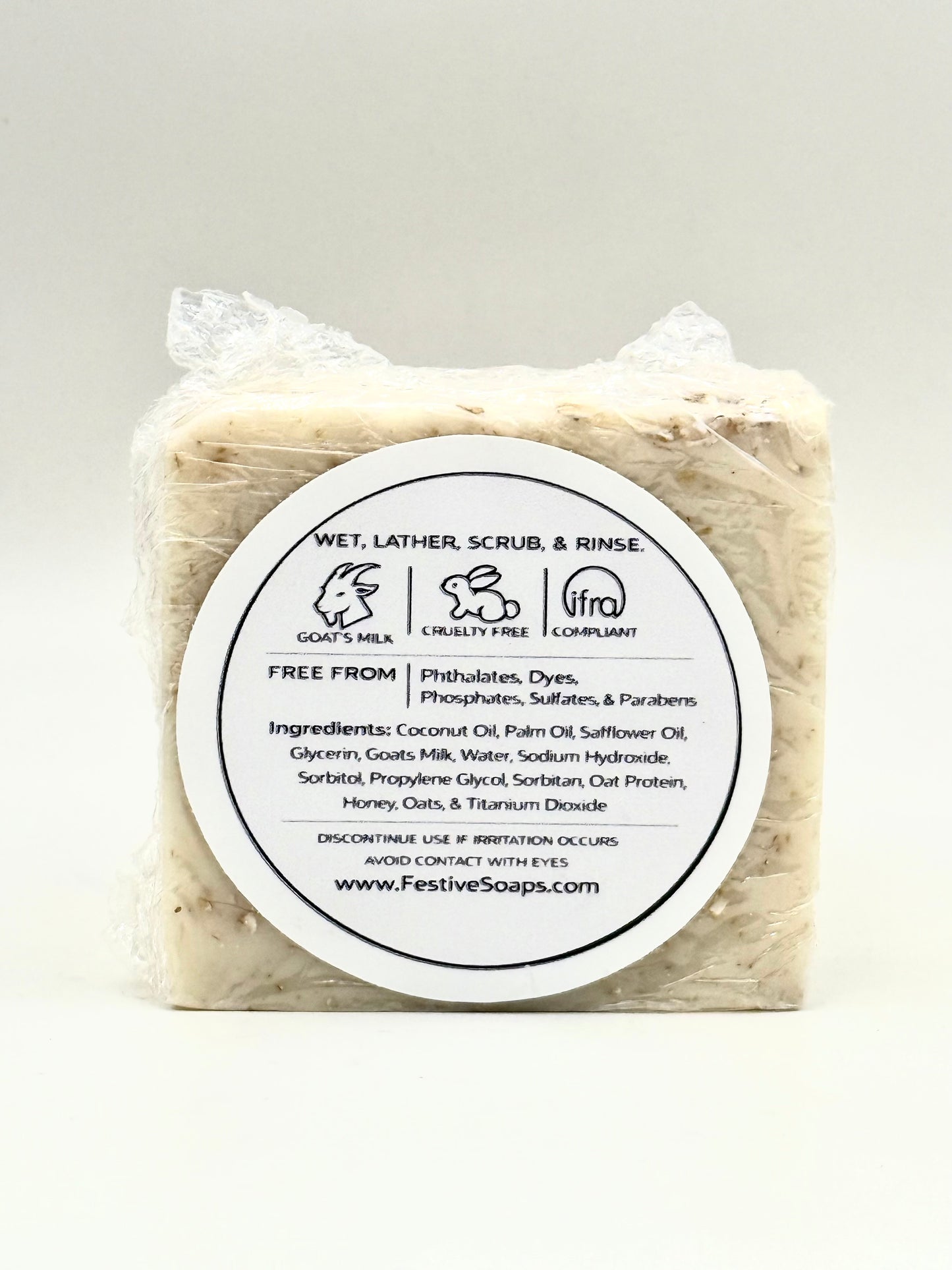 Bar of soap with a label on a white background