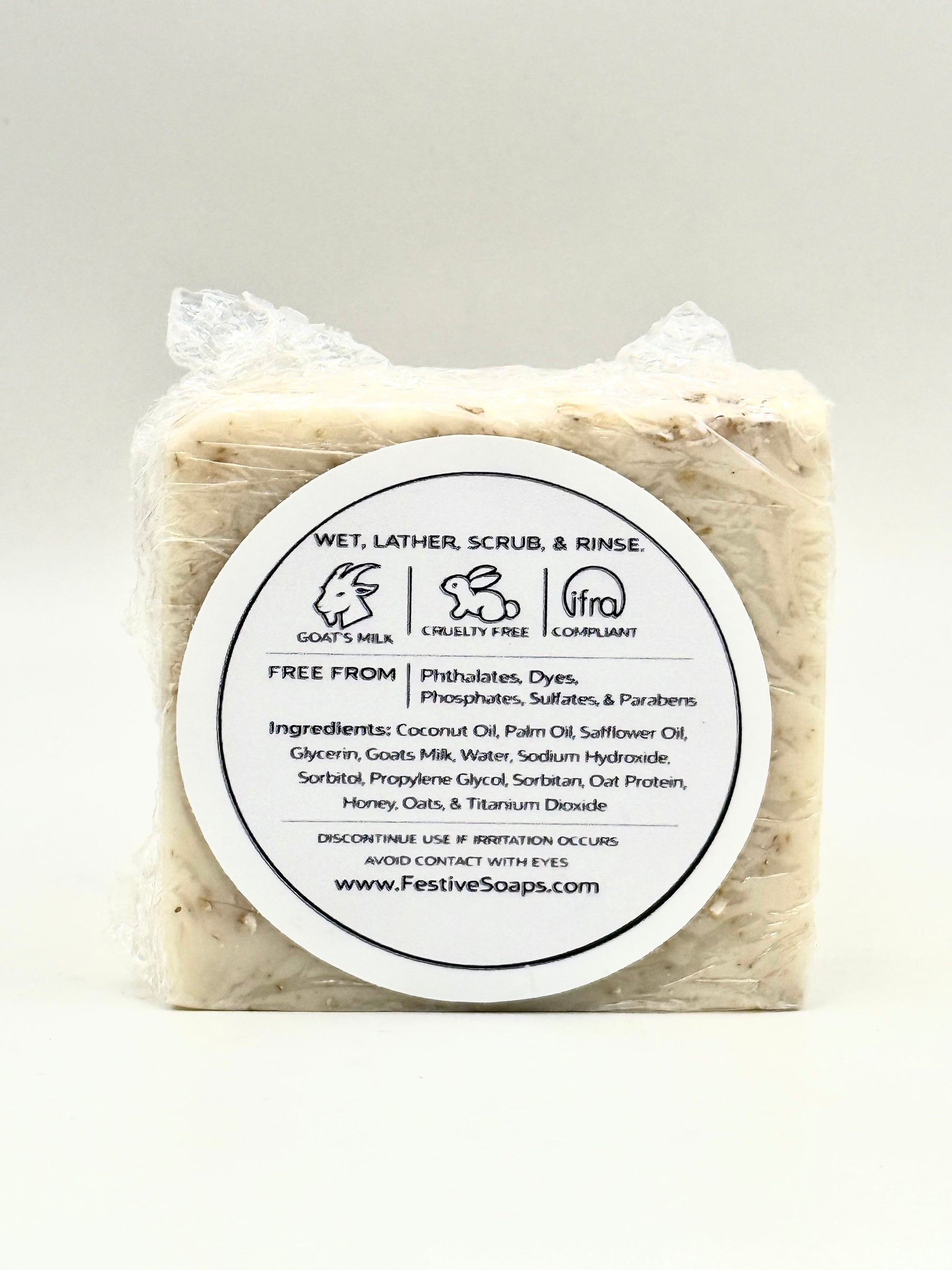 Bar of soap with a label on a white background