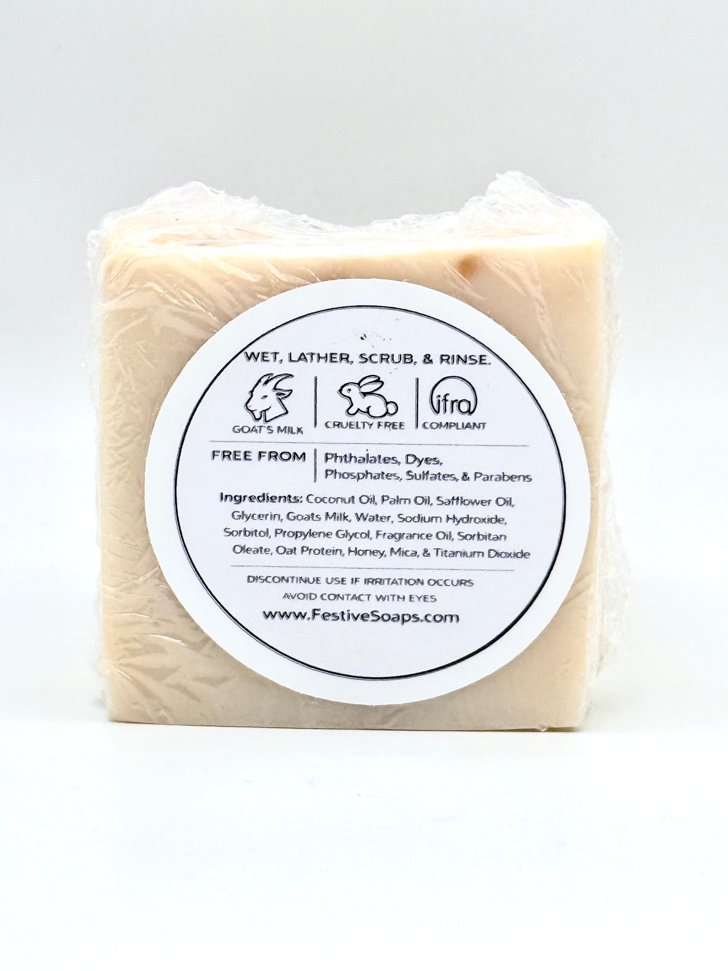 Bar of soap with a label on a white background
