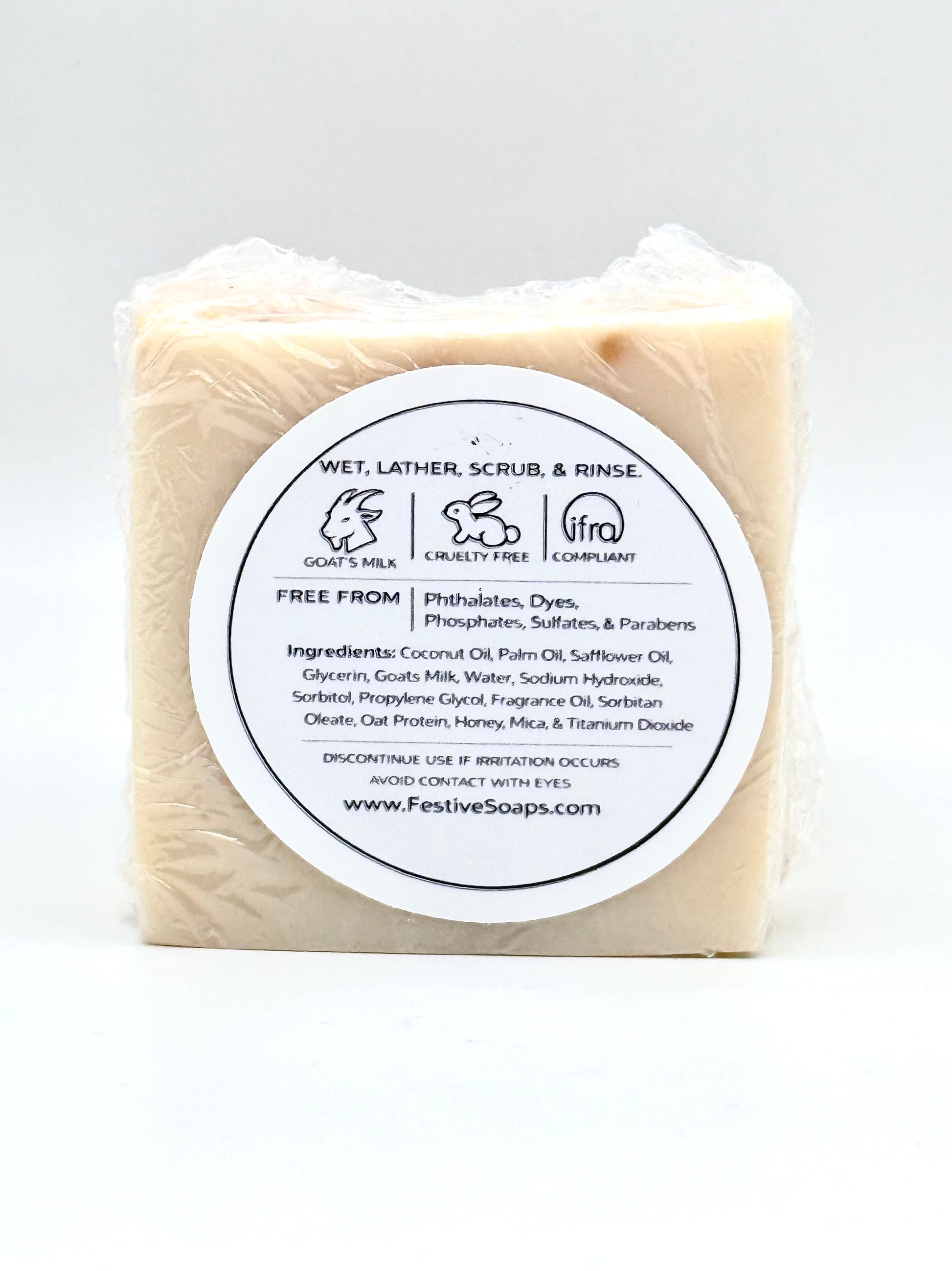 Bar of soap with a label on a white background