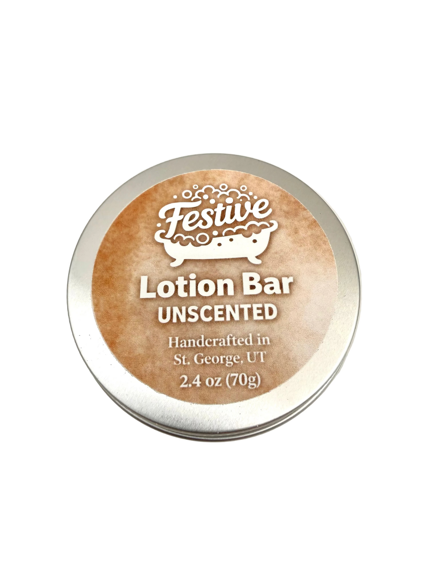 Festive Lotion Bar tin with label on a light beige background